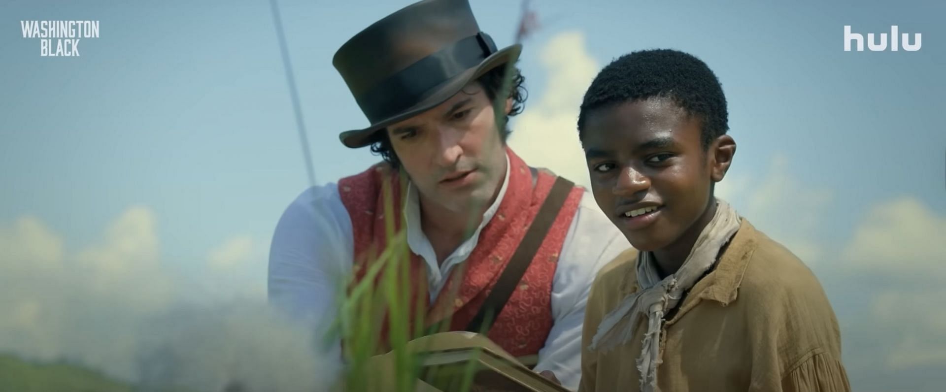 Tom Ellis as Christopher 'Titch' Wilde (Image via YouTube/Hulu)